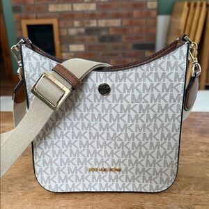 Michael Kors Briley Small Logo Messenger Bag in the vanilla color. Crossbody Bag
